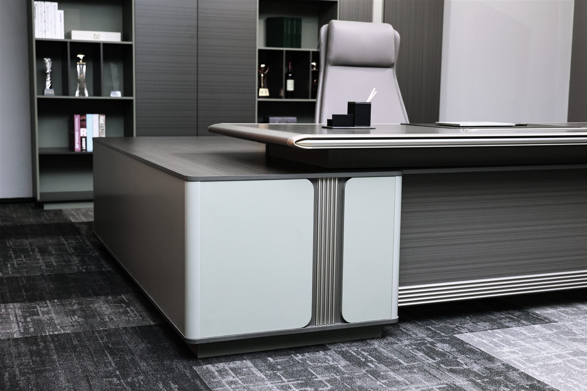 Executive desk edge with side cabinet
