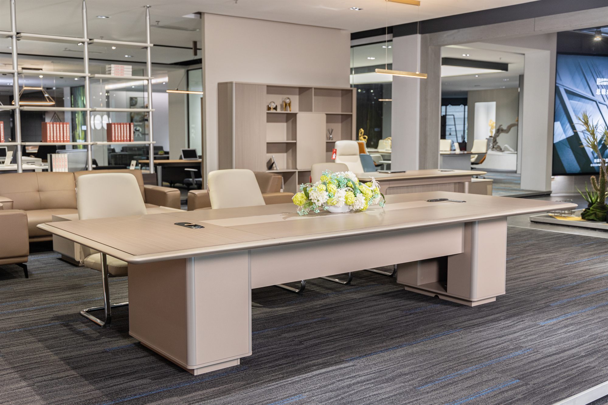 Conference room with 12-seat table and leather chairs